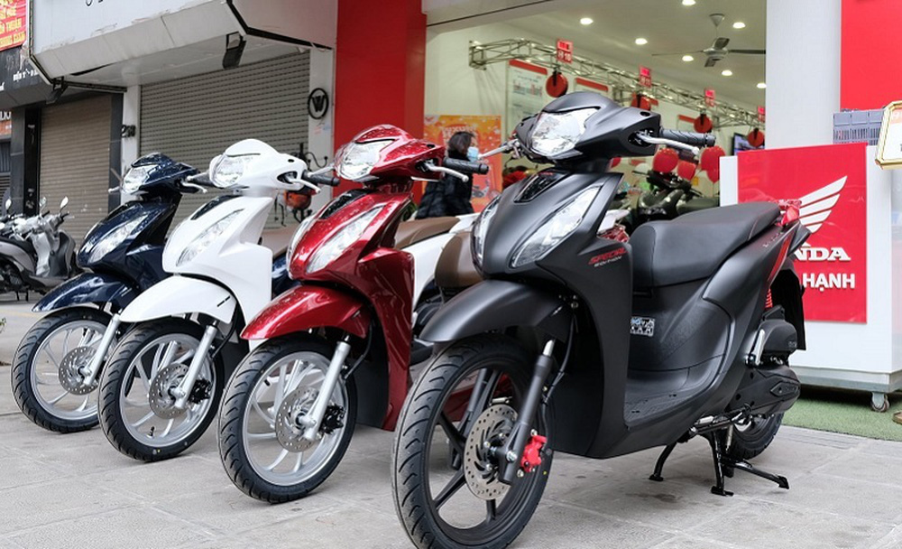 Bất ngờ con số người Việt tậu xe máy Honda, mẫu tay ga 30 triệu gây sốt nhất năm 2021 - Ảnh 1. Bất ngờ con số người Việt tậu xe máy Honda, mẫu tay ga 30 triệu gây sốt nhất năm 2021 - Ảnh 1.