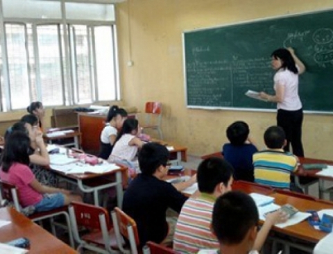 Trong một lớp bồi dưỡng kiến thức văn hóa cho HS lớp 5 chuẩn bị thi lên lớp 6 ở Hà Nội. (Ảnh minh họa, Ảnh: Văn Chung)