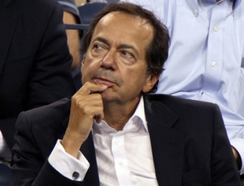 John Paulson đang điêu đứng vì giá vàng. Ảnh: Bloomberg