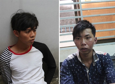 Nguyễn Trọng Tín (trái) và Nguyễn Văn Việt bị tạm giữa tại cơ quan công an