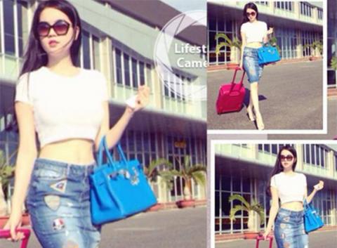 Ngọc Trinh nổi bật với trang phục sân bay đơn giản, trẻ trung