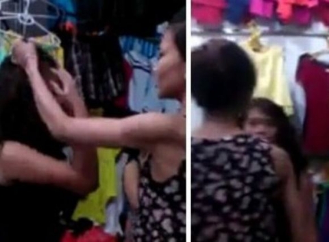 Nữ sinh ăn cắp đồ bị đánh, bắt cởi quần giữa chợ