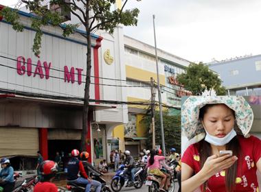 Cô gái đu ngọn cây thoát khỏi đám cháy tiệm giày MT