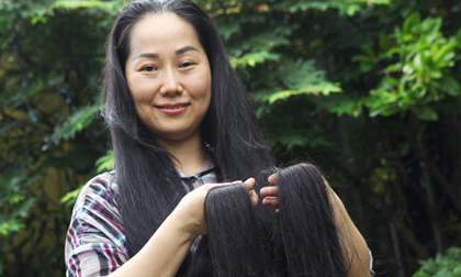Người phụ nữ có mái tóc dài nhất VN: 'Cả gia đình tôi phải ngủ ngược giường'