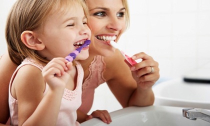 Cách chăm sóc sức khỏe răng miệng của trẻ trong ngày Tết