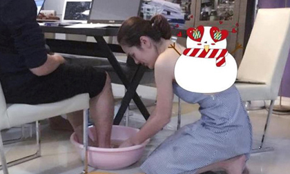 Cận ngày 8/3, bức ảnh nữ doanh nhân xinh đẹp rửa chân cho chồng 'vì nghĩa' khiến dân mạng xôn xao