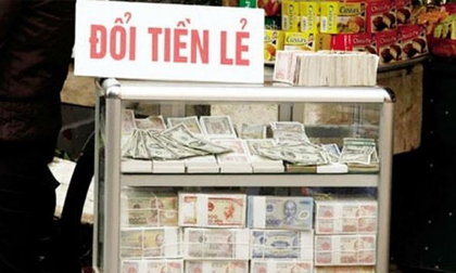Đổi tiền lẻ để hưởng chênh lệch có thể bị phạt tới 40 triệu đồng