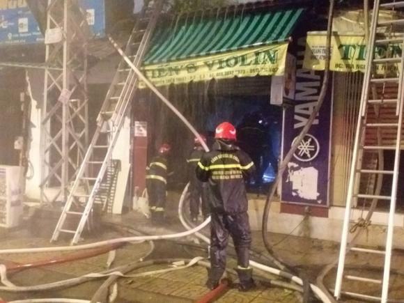 Điều tra vụ cháy khiến 2 người tử vong ở TP.HCM - Ảnh 1.